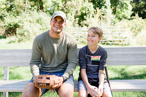 Big Brothers Big Sisters of Dane County, playing baseball, big brother Sam sitting next to little brother Colson